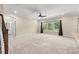Spacious living room with ceiling fan and backyard access at 5440 Overland Trl, North Charleston, SC 29420