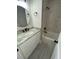 Updated bathroom features a granite vanity, white cabinets, and a walk-in shower at 5730 Hoover Ave, Hanahan, SC 29410