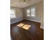 Spacious bedroom with hardwood floors and lots of natural light at 5730 Hoover Ave, Hanahan, SC 29410