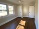 Bright bedroom with hardwood floors and ample closet space at 5730 Hoover Ave, Hanahan, SC 29410