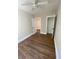 Spacious bedroom with hardwood floors and ceiling fan at 5730 Hoover Ave, Hanahan, SC 29410