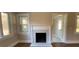 White marble fireplace with a classic mantel at 5730 Hoover Ave, Hanahan, SC 29410