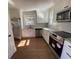 Modern kitchen with stainless steel appliances and white cabinets at 5730 Hoover Ave, Hanahan, SC 29410
