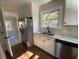 Updated kitchen features stainless steel appliances and granite countertops at 5730 Hoover Ave, Hanahan, SC 29410