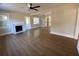 Spacious living room featuring hardwood floors and a fireplace at 5730 Hoover Ave, Hanahan, SC 29410