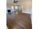 Hardwood floors and fireplace in a bright living room at 5730 Hoover Ave, Hanahan, SC 29410