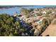 Aerial view of waterfront community with homes and lush trees at 601 Levee Dr, Moncks Corner, SC 29461