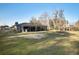 Large backyard with covered patio, and mature trees at 601 Levee Dr, Moncks Corner, SC 29461