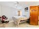 Spacious bedroom with a rocking chair and window at 601 Levee Dr, Moncks Corner, SC 29461