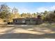 Brick ranch home with covered porch and large yard at 601 Levee Dr, Moncks Corner, SC 29461