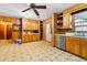 Kitchen with wood cabinets, tiled floor, and appliances at 601 Levee Dr, Moncks Corner, SC 29461