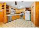 Classic kitchen with wood cabinets, vinyl flooring, and stainless steel appliances at 601 Levee Dr, Moncks Corner, SC 29461
