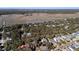 Aerial view of neighborhood, showcasing houses and landscape at 613 Pompano St, Edisto Island, SC 29438