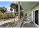 Relaxing deck overlooking backyard and neighborhood at 613 Pompano St, Edisto Island, SC 29438