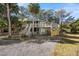 Charming two-story beach cottage with large deck at 613 Pompano St, Edisto Island, SC 29438