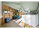 Convenient laundry room with washer and dryer, located on the porch at 613 Pompano St, Edisto Island, SC 29438