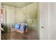 Relaxing porch swing on a screened-in porch at 613 Pompano St, Edisto Island, SC 29438