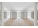 Bright and airy basement with dormer windows and neutral gray walls at 7003 Old Landing Dr, Hanahan, SC 29410