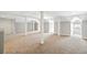 Spacious finished basement with neutral carpeting and abundant natural light at 7003 Old Landing Dr, Hanahan, SC 29410