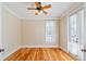 Home office with hardwood floors, large window, and French doors at 7003 Old Landing Dr, Hanahan, SC 29410