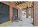 Covered storage area with brick columns and ample space for bikes at 7003 Old Landing Dr, Hanahan, SC 29410