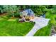 Two-story home with a large yard, driveway, and flag at 975 Mayfield St, Summerville, SC 29485