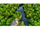 Waterfront lot with lush greenery and nearby homes at 975 Mayfield St, Summerville, SC 29485