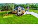 House with a spacious lawn and flag at 975 Mayfield St, Summerville, SC 29485