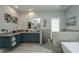 Elegant bathroom with a soaking tub, walk-in shower, and modern vanity at 975 Mayfield St, Summerville, SC 29485