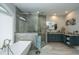 Bathroom with soaking tub, walk-in shower, and modern vanity at 975 Mayfield St, Summerville, SC 29485