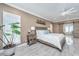 Main bedroom with king-size bed, dresser, and large windows at 975 Mayfield St, Summerville, SC 29485