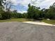Concrete boat ramp into a pond surrounded by trees at 975 Mayfield St, Summerville, SC 29485