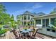 Outdoor kitchen and dining area on a large deck at 975 Mayfield St, Summerville, SC 29485