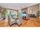 Spacious dining area with hardwood floors and stylish wicker chairs at 975 Mayfield St, Summerville, SC 29485