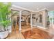 Bright entryway with hardwood floors and plants at 975 Mayfield St, Summerville, SC 29485