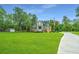Two story home with a long driveway and a spacious lawn at 975 Mayfield St, Summerville, SC 29485