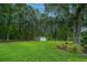 Detached three-car garage nestled in a wooded area at 975 Mayfield St, Summerville, SC 29485