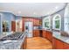 Modern kitchen with granite countertops, stainless steel appliances, and hardwood floors at 975 Mayfield St, Summerville, SC 29485