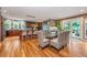 Modern kitchen with dark wood cabinets, a large island, and access to a patio at 975 Mayfield St, Summerville, SC 29485