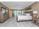 Spacious main bedroom with king-size bed, large closet, and private access to backyard at 975 Mayfield St, Summerville, SC 29485