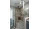 Walk-in shower with pebble floor and multiple shower heads at 975 Mayfield St, Summerville, SC 29485