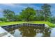 Serene waterfront property with private dock and lush landscaping at 975 Mayfield St, Summerville, SC 29485