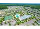 Aerial view showing community pool, tennis courts, and clubhouse at 105 Waxwing Dr, Summerville, SC 29483