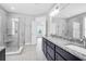 Modern bathroom with double vanity, granite countertop and large shower at 105 Waxwing Dr, Summerville, SC 29483