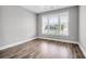 Bright bedroom featuring hardwood floors and large windows at 105 Waxwing Dr, Summerville, SC 29483