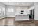 Open concept kitchen with island and hardwood floors at 105 Waxwing Dr, Summerville, SC 29483