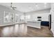 Open concept living room and kitchen with hardwood floors at 105 Waxwing Dr, Summerville, SC 29483