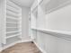 Spacious walk-in closet with ample shelving and hanging rods at 105 Waxwing Dr, Summerville, SC 29483