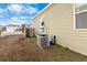 View of backyard with an AC unit and exterior wall at 115 Holly Leaf Ln, Summerville, SC 29486