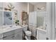 Charming bathroom with white vanity, shower, and decorative accents at 115 Holly Leaf Ln, Summerville, SC 29486